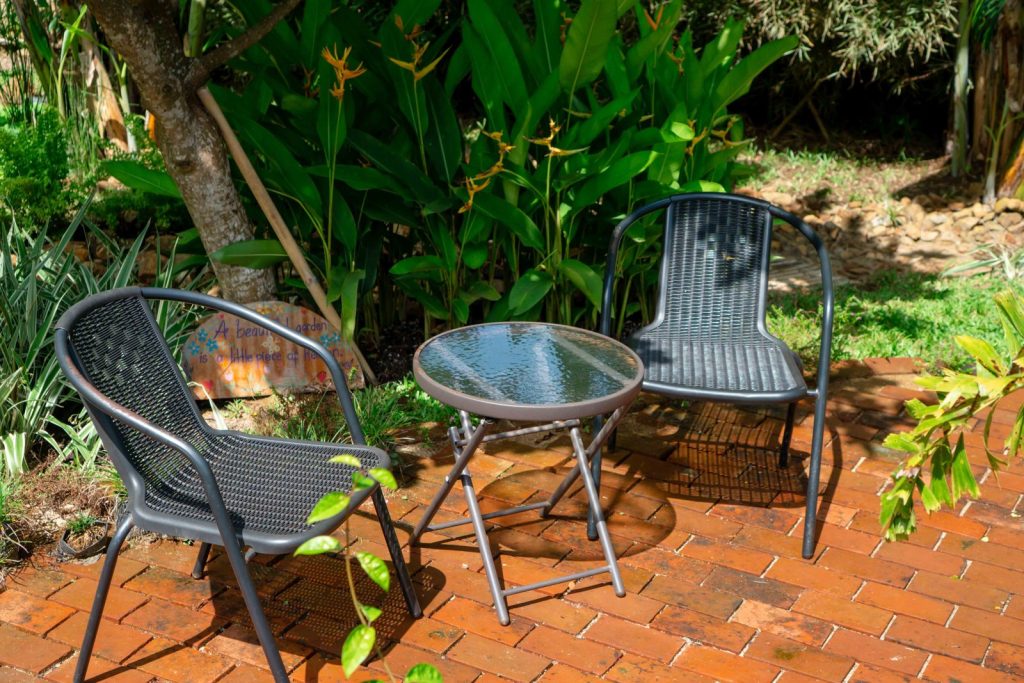 Garden seating at Talaudyong Garden Beach Cabins